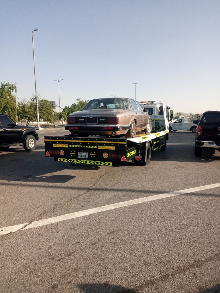 damaged car on lifter for recovery service