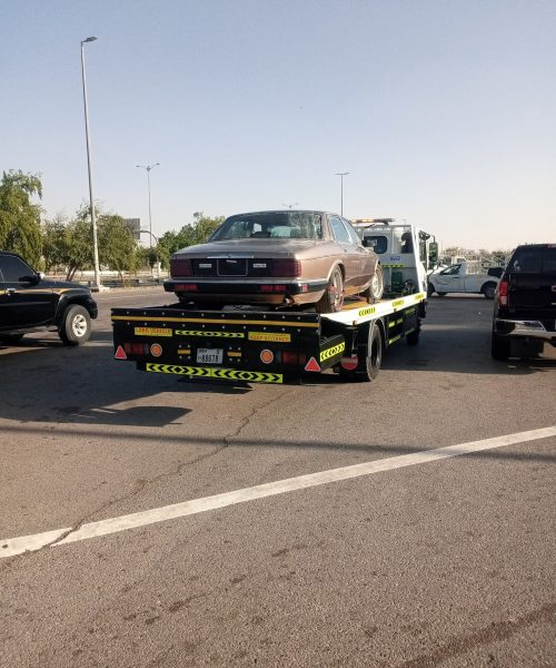 damaged car on lifter for recovery service